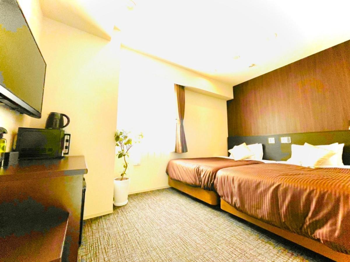 Natural Hot Spring Hotel Livemax Premium Hiroshima Esterno foto