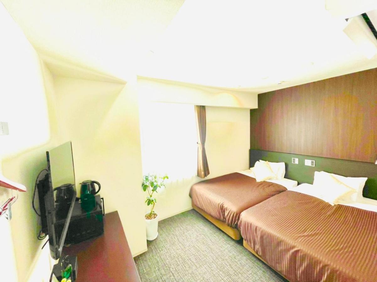 Natural Hot Spring Hotel Livemax Premium Hiroshima Esterno foto